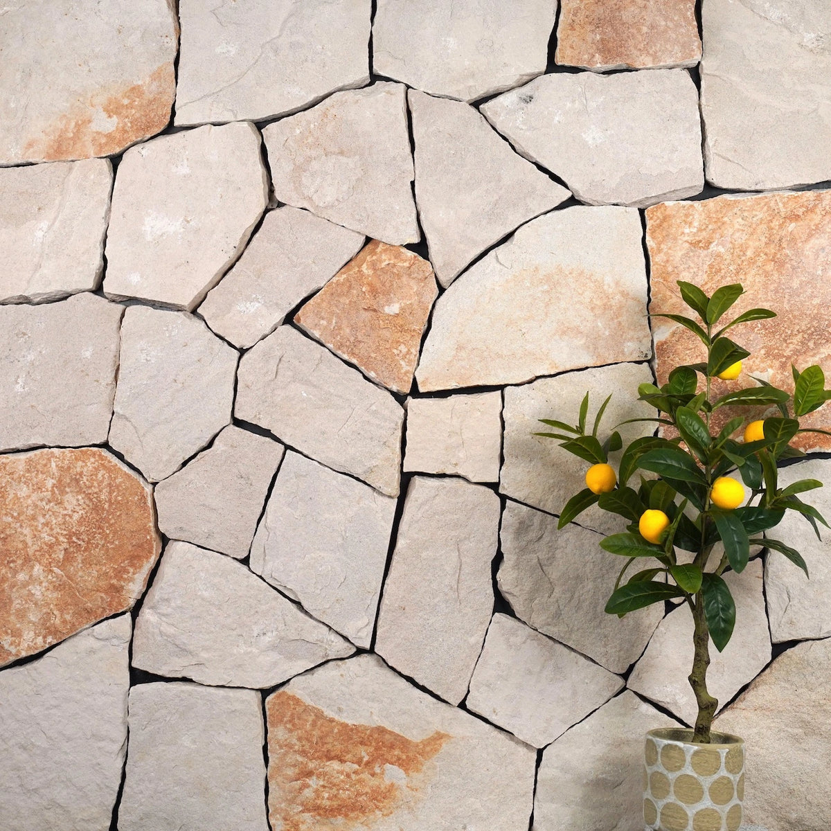 Manethi organic walling with cream split stone with orange accents — matching corner finish reference by Tilemall