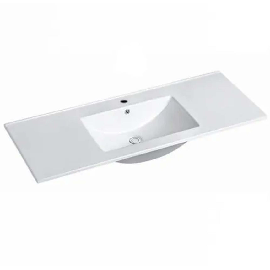 Otti Byron Fluted rectangular white ceramic basin with integrated countertop and single tap hole by Tilemall (view 3)