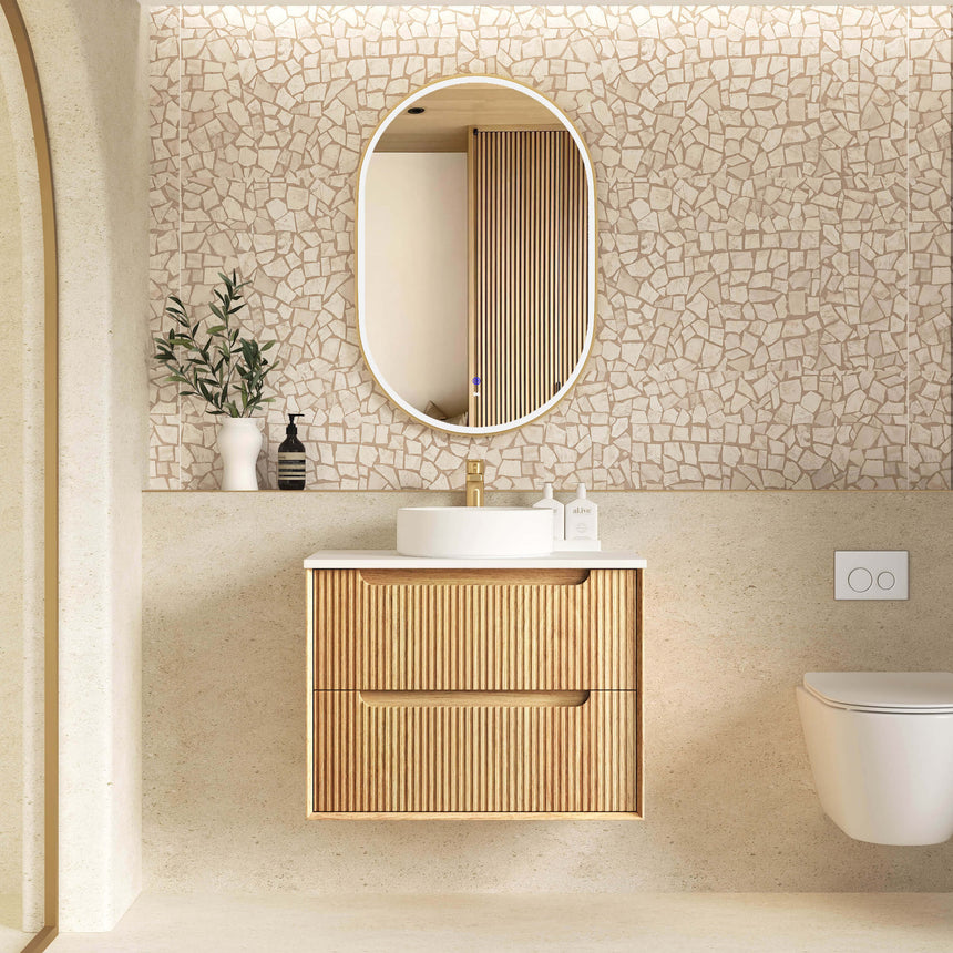 Otti Byron Fluted 750mm woodland oak vanity in bathroom interior with round LED mirror and gold fixtures by Tilemall