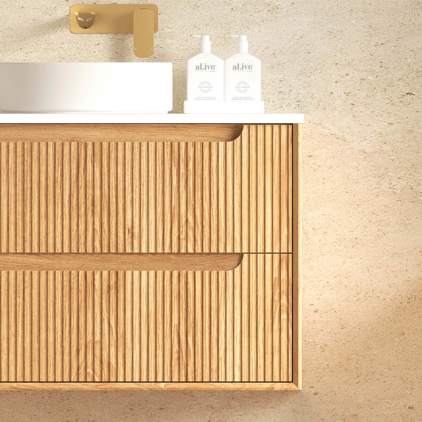 Open drawer view of Otti Byron Fluted vanity showing storage and internal compartments in woodland oak by Tilemall