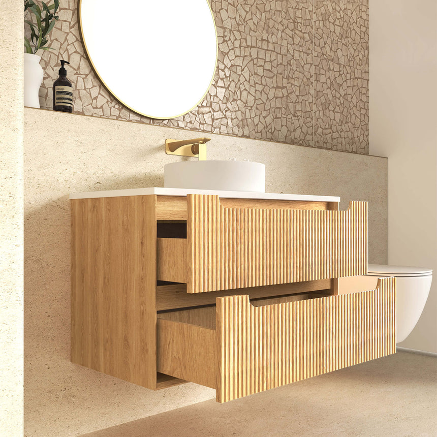 Otti Byron Fluted vanity next to toilet in bathroom, showing full installation beside white porcelain suite by Tilemall