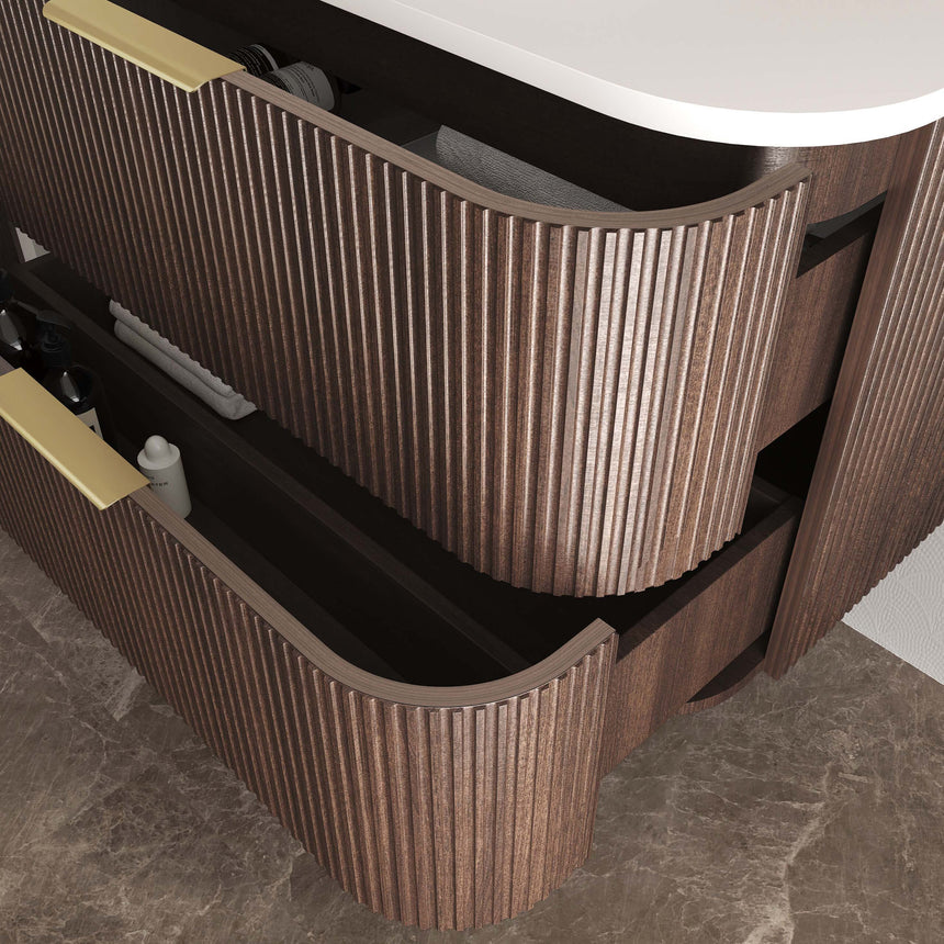 Otti Havana Fluted close-up of sable walnut fluted drawer fronts with brass handle and soft-close mechanism by Tilemall