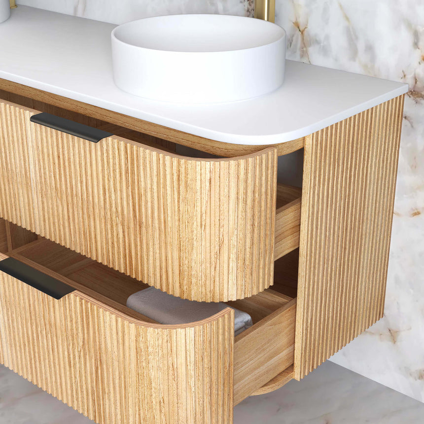 Detail of Otti Havana Fluted vessel basin with brass tap and white stone counter surface by Tilemall