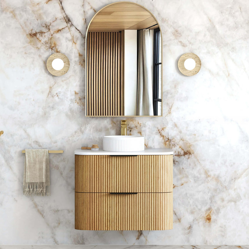 Otti Havana Fluted 750mm woodland oak vanity installed in bathroom interior with arched mirror by Tilemall