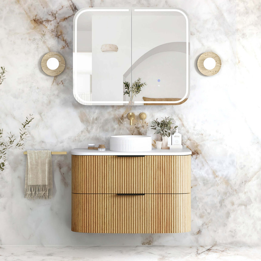 Otti Havana Fluted 900mm woodland oak vanity installed with LED mirror and travertine sconces by Tilemall