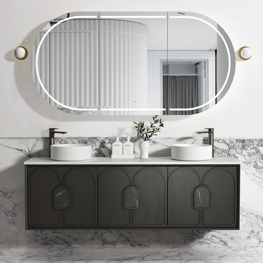 Otti Laguna MK II 1800mm vanity in modern bathroom setting with oval LED framed mirror and six-panel black oak cabinet doors by Tilemall