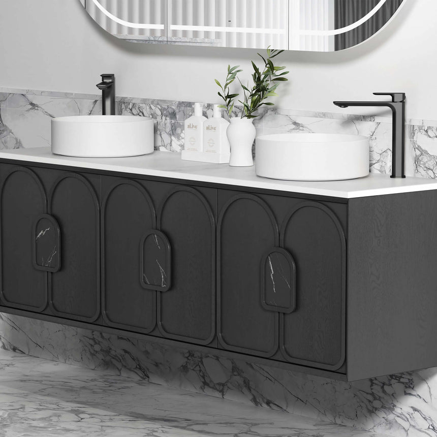 Otti Laguna MK II vanity detail showing black matte wall-mounted taps with white round vessel basins and arch-panel doors by Tilemall
