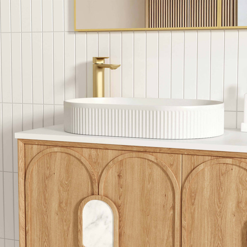 Close-up of Otti Laguna MK II vanity drawer showing natural woodland oak grain and brass handle by Tilemall