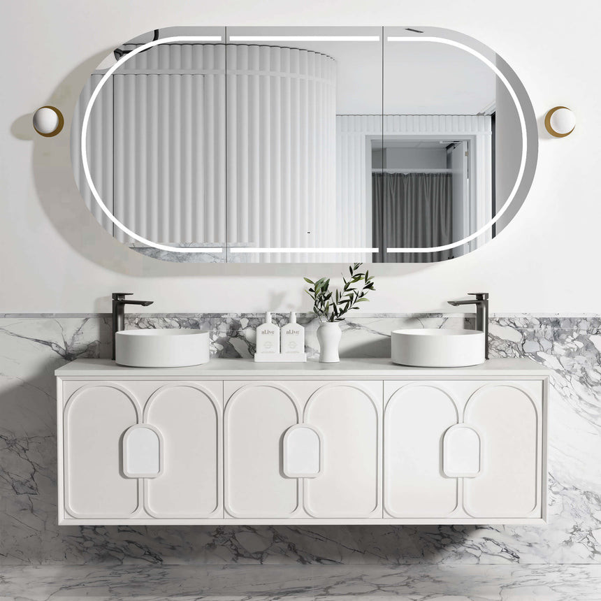 Otti Laguna MK II 1800mm matte white vanity installed in modern ensuite with marble splashback and LED oval mirror by Tilemall