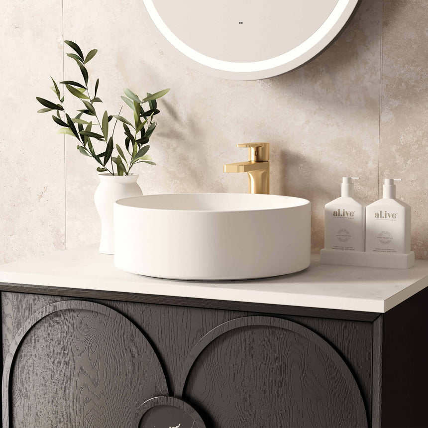 Close-up of Otti Laguna MK II vanity white vessel basin with brass single-hole tap by Tilemall