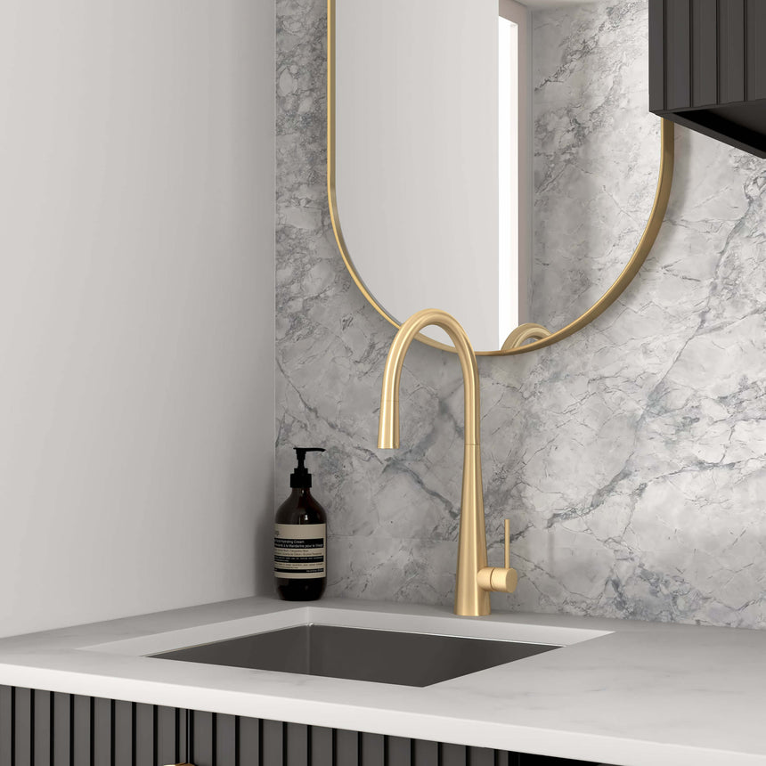 Close-up of Otti Marlo laundry sink with brass tap and matte black cabinet fronts by Tilemall