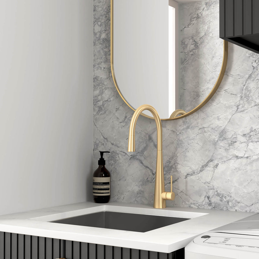 Close-up of Otti Marlo Mini laundry sink with brass tap and white undermount bowl by Tilemall