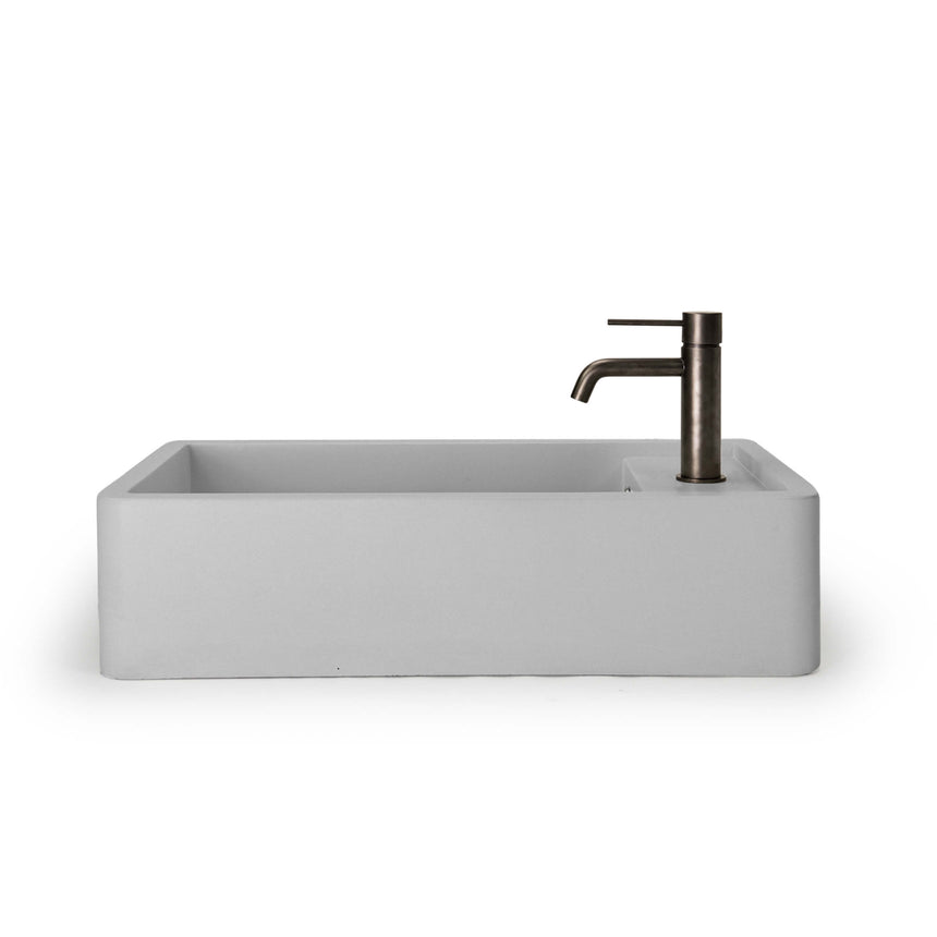 Nood Co Shelf 02 cloud basin installed with matte black cylindrical tap by Tilemall