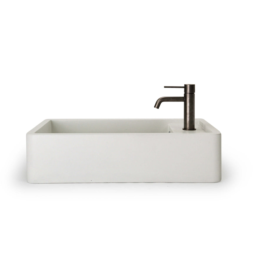 Nood Co Shelf 02 ivory basin installed with matte black cylindrical tap by Tilemall