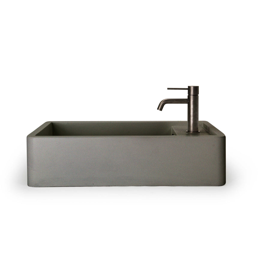 Nood Co Shelf 02 surface mount basin by Tilemall installed with black cylindrical mixer tap
