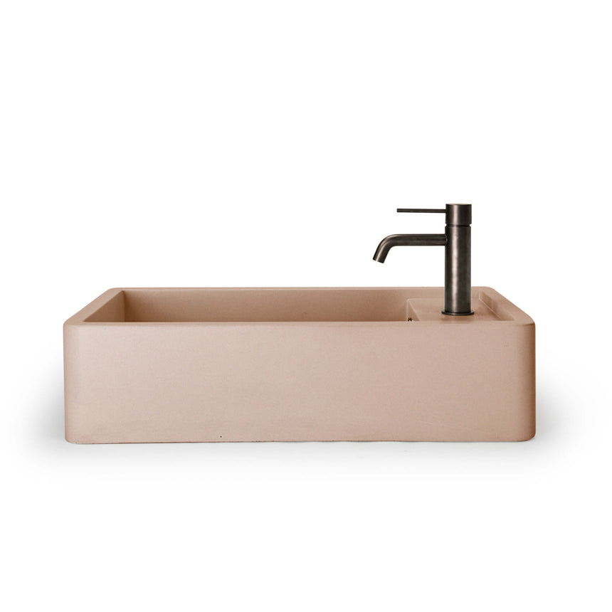 Nood Co Shelf 02 pastel peach basin installed with black cylindrical tap, no overflow by Tilemall