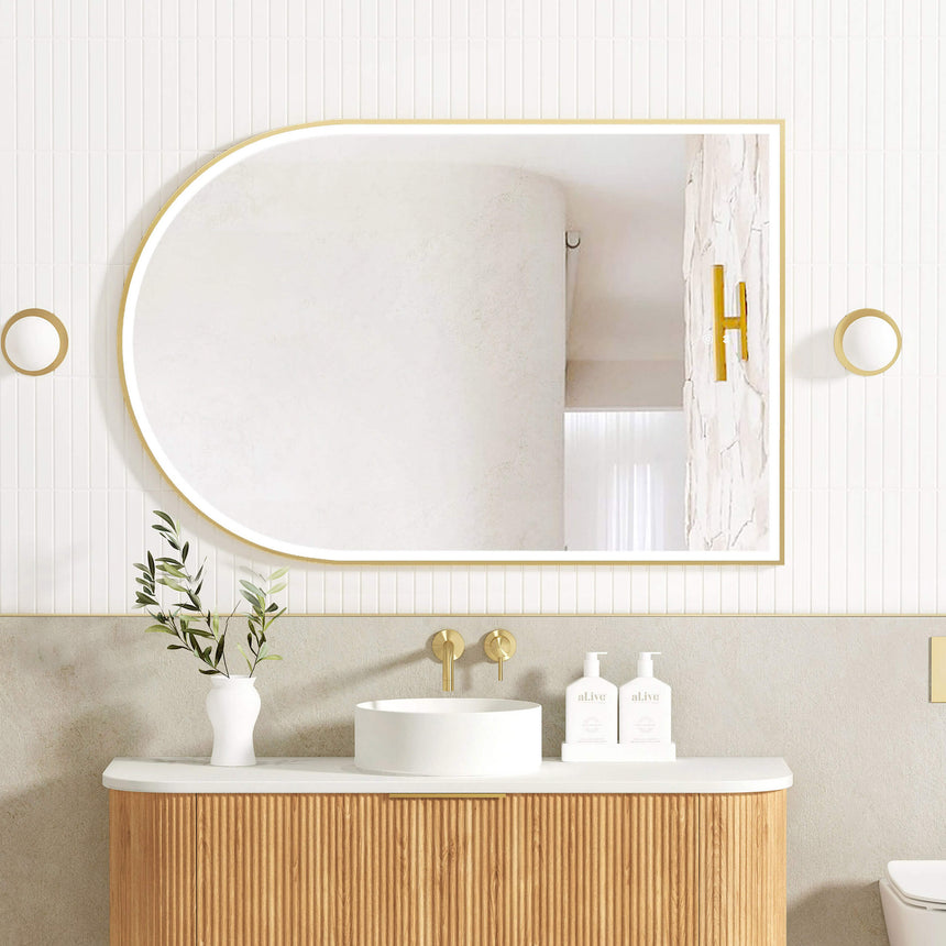 Otti Archie OT 1200x800mm LED framed mirror by Tilemall with brushed gold metal frame, installed above bathroom vanity