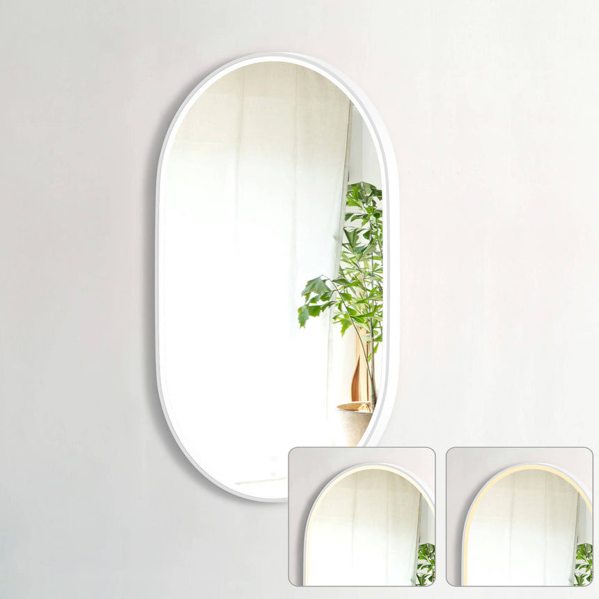 Otti Noosa oval LED bathroom mirror white frame 900x600mm by Tilemall, showing warm light option