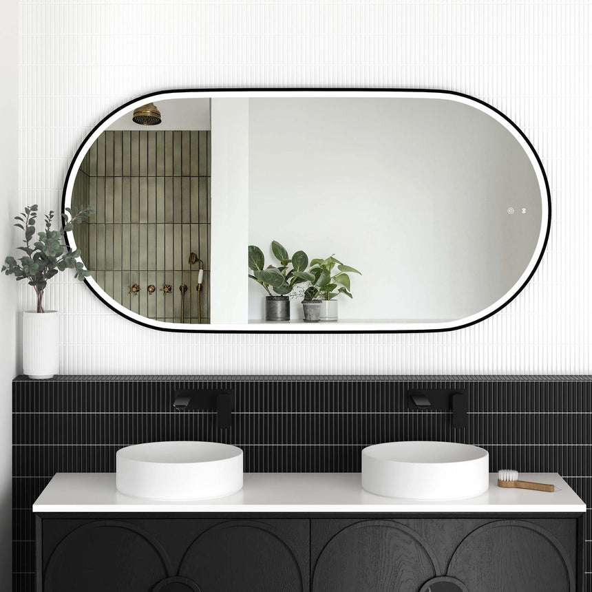 Otti Noosa 1500x750mm LED framed mirror by Tilemall with matte black metal frame, installed above black vanity with dual
