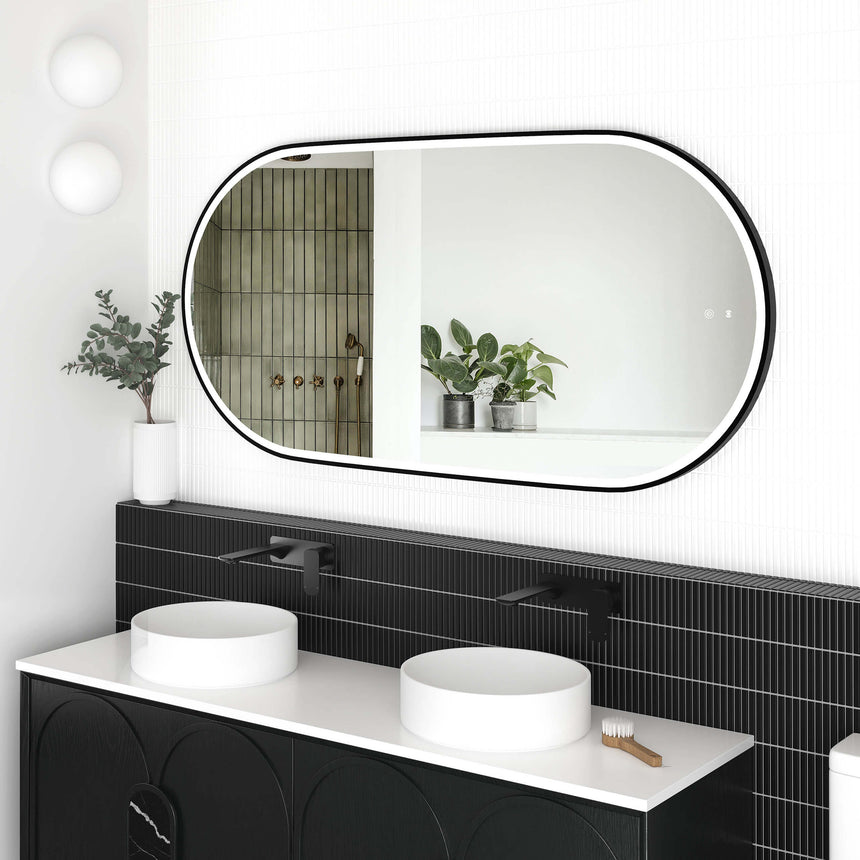 Otti Noosa LED mirror 1500x750mm matte black frame by Tilemall in ensuite setting with white wall tiles and dual white