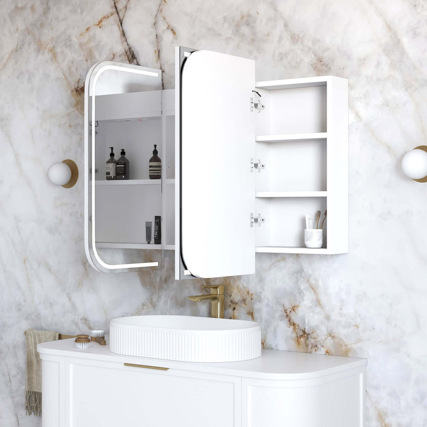 Otti Newport three-door LED shaving cabinet by Tilemall, white, open doors revealing shelved interior