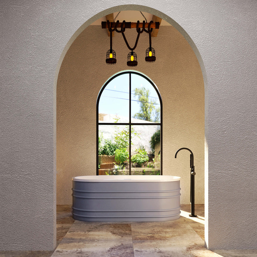 BelBagno Bath bucciano bathtub installed in modern bathroom interior with arched alcove, floor-mounted black tap by Tilemall