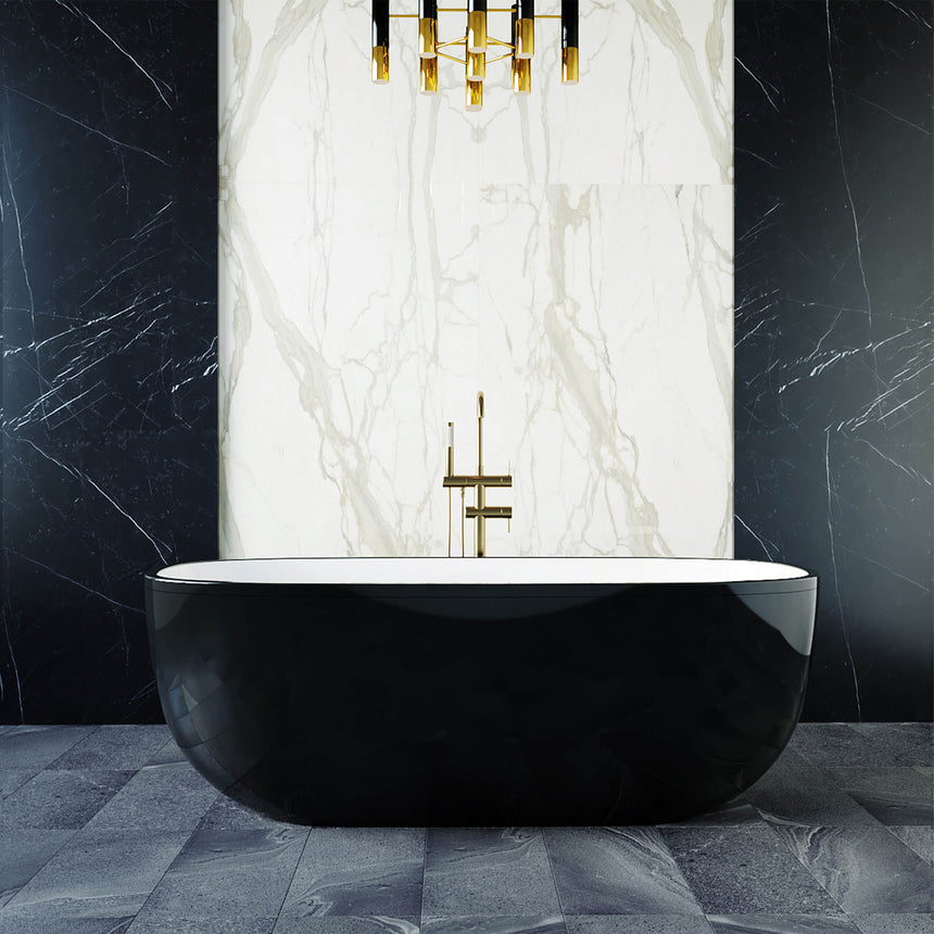 BelBagno Bath Sapphire Black freestanding bathtub installed in bathroom interior with marble tile and gold fixtures by Tilemall