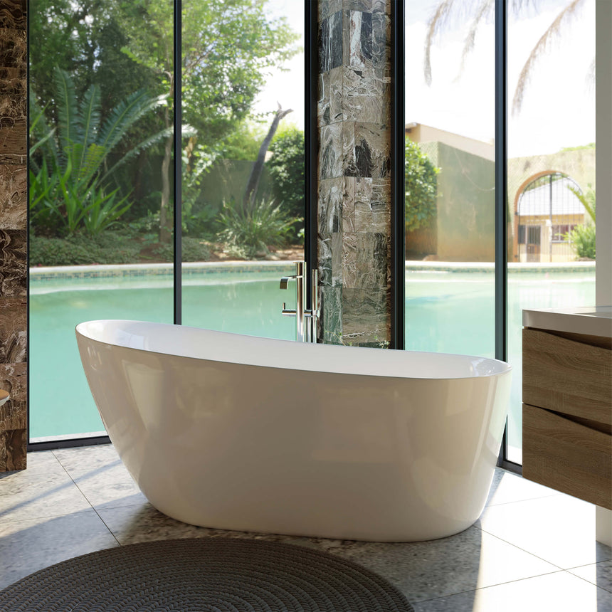 Romano freestanding acrylic bathtub by Tilemall, 1700mm, gloss white, installed in modern bathroom with pool view