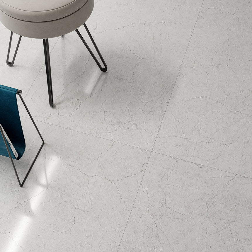 Crema Marfil 1200x600mm bianco porcelain floor tiles in living area with soft grey crack-like veining pattern by Tilemall
