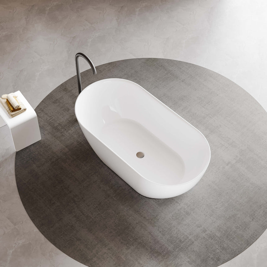 Lukka Freestanding bath ellips Slim freestanding acrylic bathtub by Tilemall in gloss white 1530mm, installed in bathroom