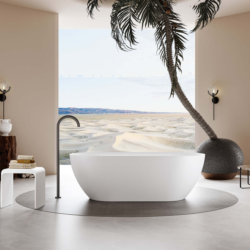 Ellips Slim freestanding acrylic bathtub by Tilemall in gloss white, 1700mm, installed in bathroom interior