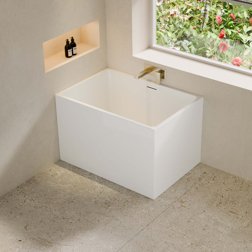 Lukka Back to Wall Bath 1000x680mm crete Multifit gloss white freestanding bathtub, rectangular shape with overflow detail by Tilemall