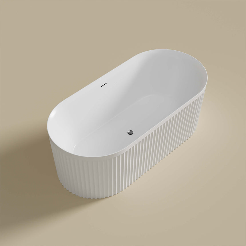 Florence 1700x800mm freestanding bathtub by Tilemall, matte white oval shape showing overflow drain and fluted sides