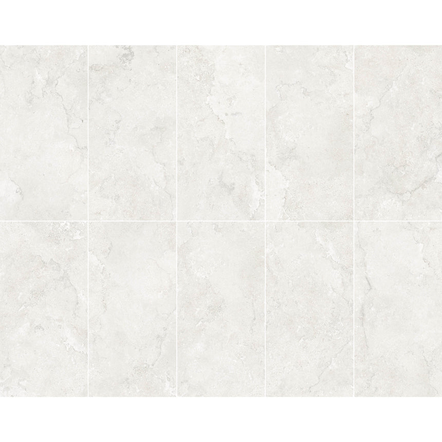 Portland 1200x600x9.5mm ivory stone-look porcelain tiles in grid layout showing natural veining variation across tiles by Tilemall