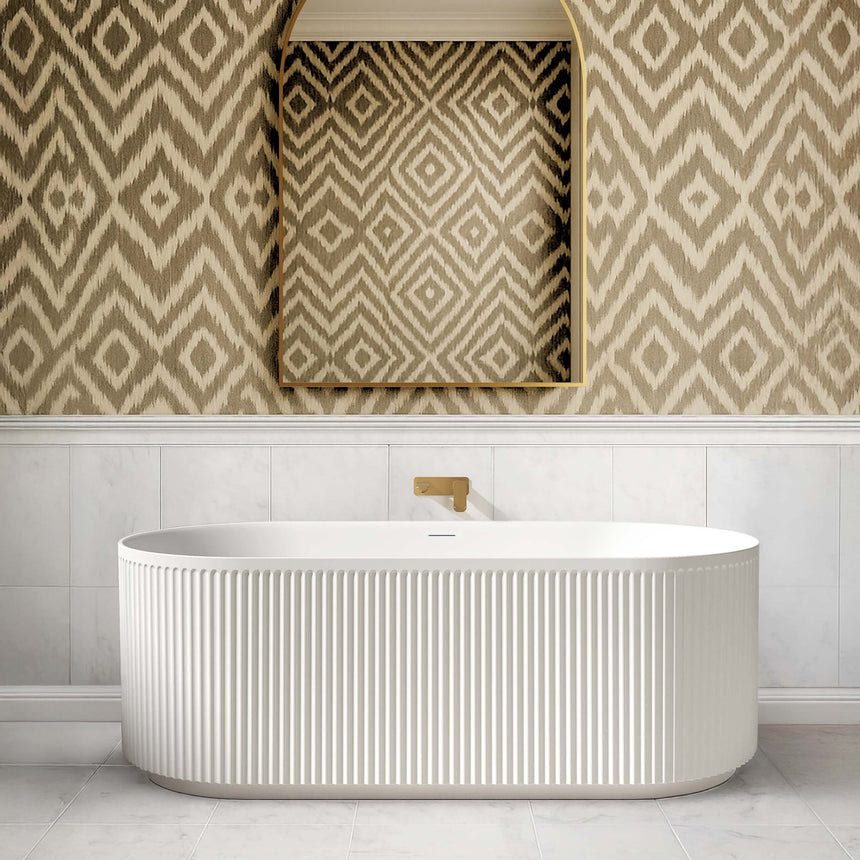 Otti Attica Havana bathtub installed in bathroom interior with white subway tile and patterned wallpaper by Tilemall