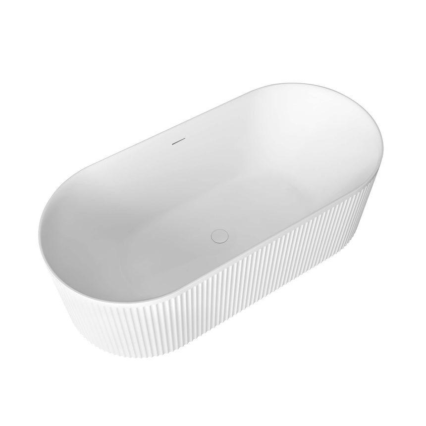 Side view of Otti Attica Havana matte white freestanding bathtub showing fluted panel and overflow detail by Tilemall