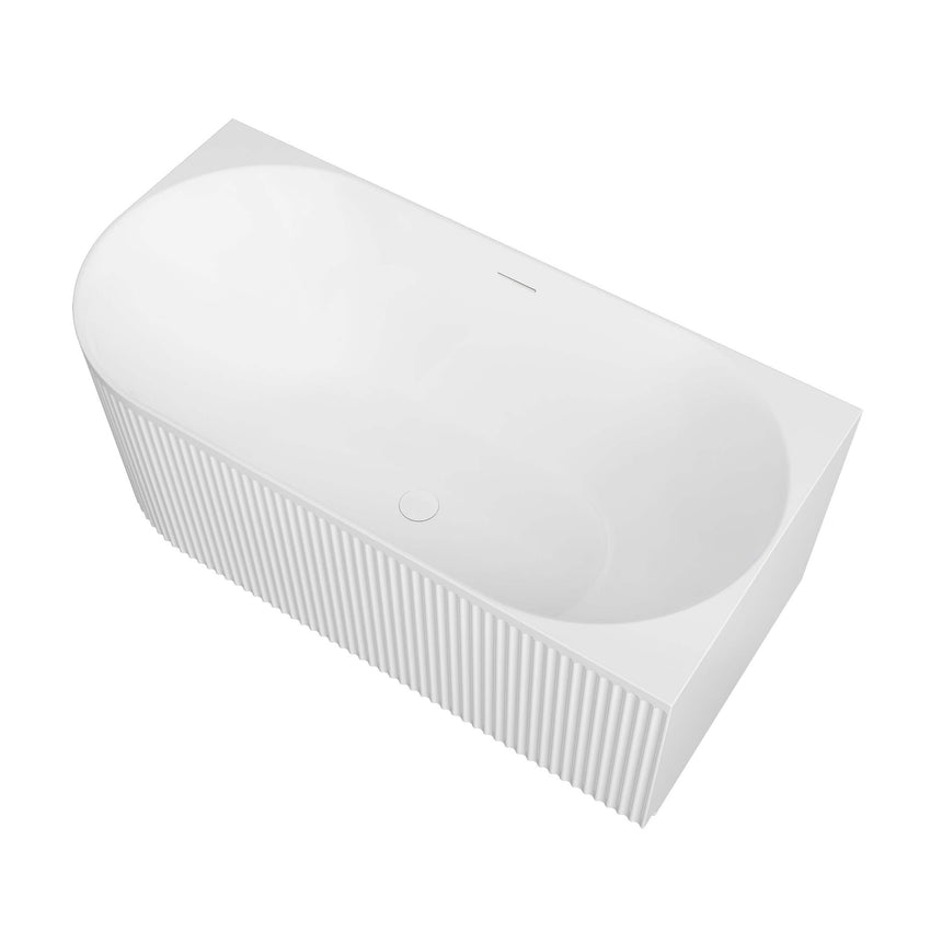 Angled view of Otti Attica Havana 1500mm matte white freestanding bath with fluted side panel by Tilemall