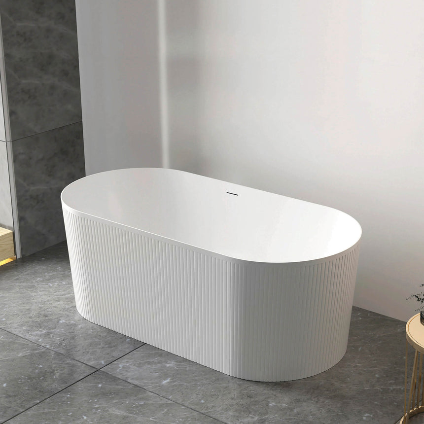 Otti Attica Noosa bathtub installed in modern bathroom, gloss white acrylic with vertical fluting detail by Tilemall