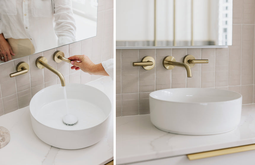 Detail of Phoenix Vivid Slimline Plus brushed gold lever mixer handles and curved spout by Tilemall