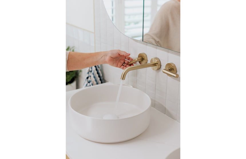 Phoenix Vivid Slimline Plus brushed gold wall-mounted mixer with left and right lever handles by Tilemall
