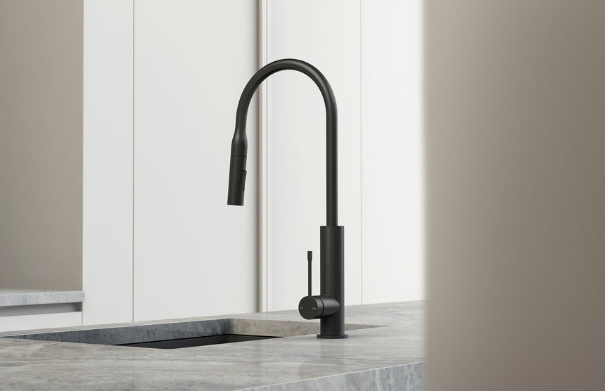 Phoenix Designer Sink Mixers Deja matte black pull-out sink mixer on marble countertop with extended spout by Tilemall