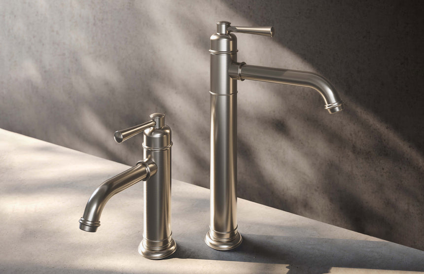 Close-up of Phoenix Cromford brushed nickel basin mixer with cylindrical body and lever handle by Tilemall