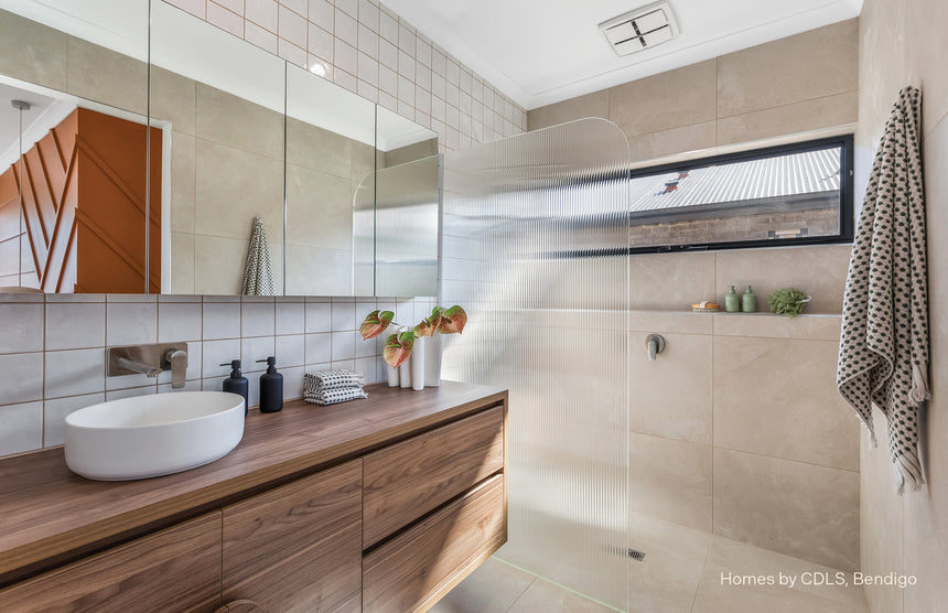 Phoenix Arlo brushed nickel wall mixer and shower system installed in modern bathroom with timber vanity by Tilemall