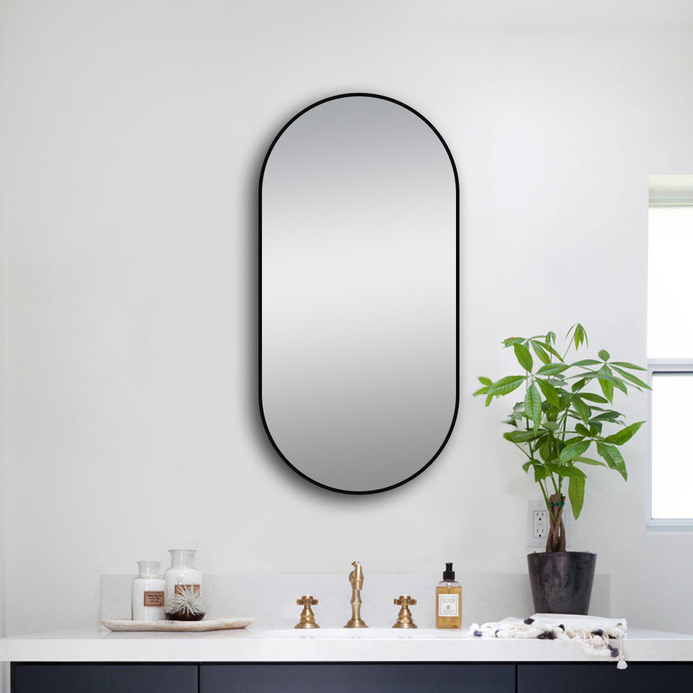 Oval LM Lamex framed mirror 500x1000mm by Tilemall with matte black frame, wall-mounted above bathroom vanity