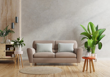 brown-sofa-wooden-table-living-room-interior-with-plant-concrete-wall