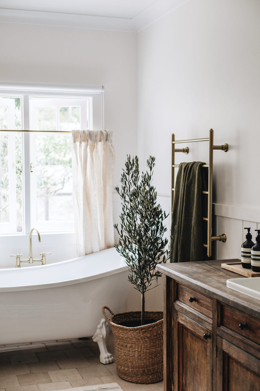 Phoenix Cromford Exposed Sink Set Brushed Gold, shown in a finished interior