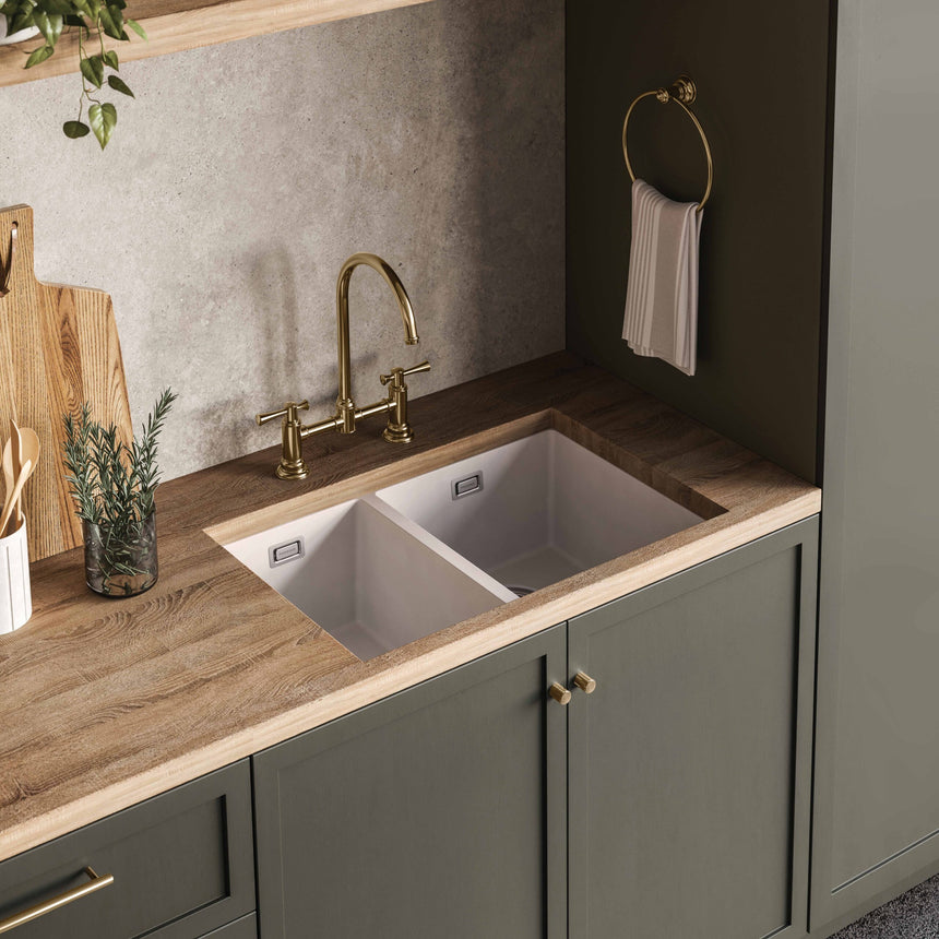 Phoenix 5000 Series 1-3/4 R/H Bowl Under / Over Sink Matte White, shown in a finished interior