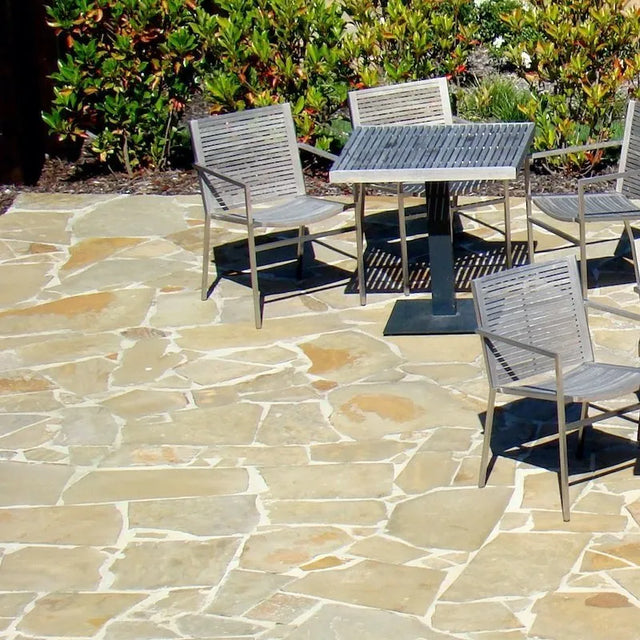 Tuscan Beige Limestone crazy paving with beige limestone in an outdoor seating area by Tilemall