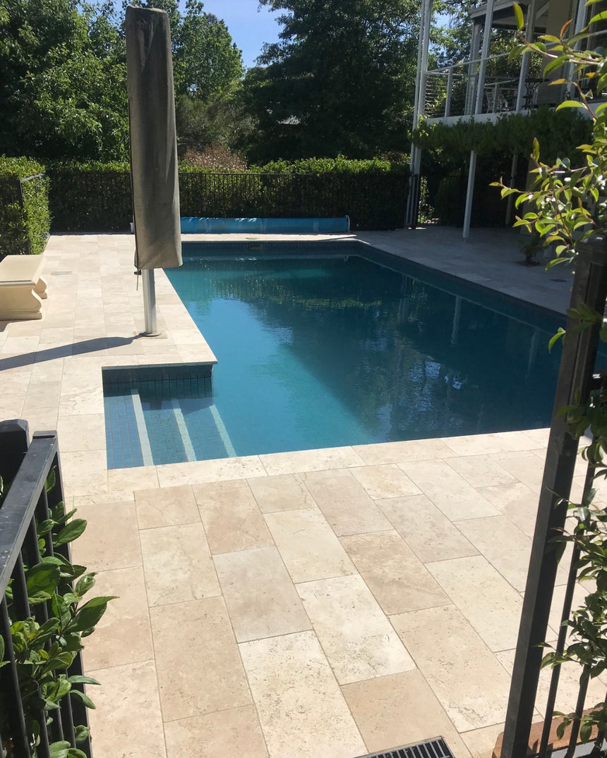 Ivory Premium Travertine natural stone surface and installation by Tilemall