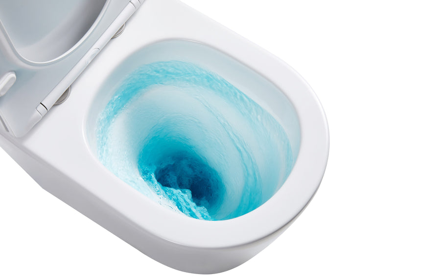 Lukka Procida close-up of Procida toilet bowl showing Tornado whirlpool single-hole rimless flush action with blue by Tilemall